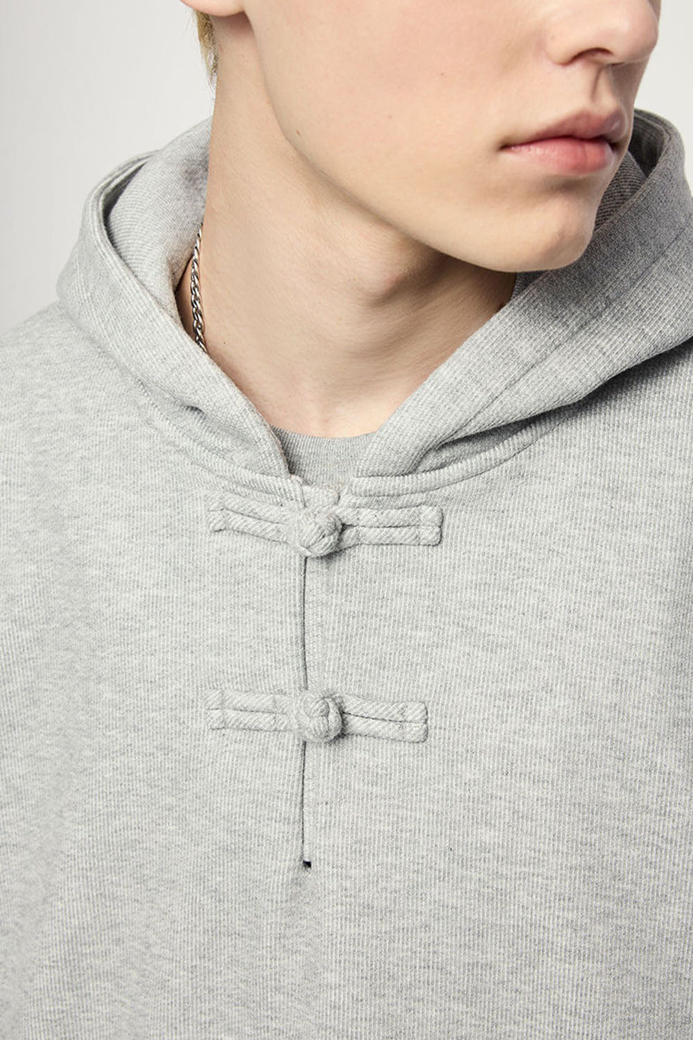 Fleece-Lined Hoodie with Traditional Frog Button Closure