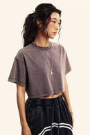 Washed Sorona Relaxed Cropped Crew-Neck T-Shirt in Raspberry Purple - three-quarter front modeled view