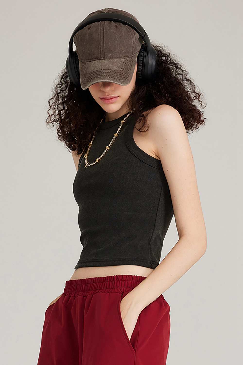 Fitted High-Neck Ribbed Cropped Tank Top in Fried Snowflakes - three-quarter front modeled view