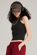 Fitted High-Neck Ribbed Cropped Tank Top in Fried Snowflakes - three-quarter front modeled view
