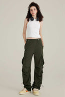 Fitted High-Neck Ribbed Cropped Tank Top in White - full-length front modeled view