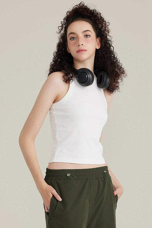 Fitted High-Neck Ribbed Cropped Tank Top in White - three-quarter front modeled view