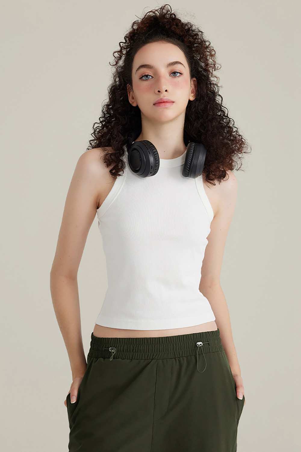 Fitted High-Neck Ribbed Cropped Tank Top in White - front modeled close-up