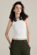 Fitted High-Neck Ribbed Cropped Tank Top in White - front modeled close-up