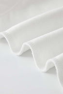 Fitted High-Neck Ribbed Cropped Tank Top in White - fabric texture close-up