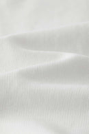 Fitted High-Neck Ribbed Cropped Tank Top in White - fabric texture close-up