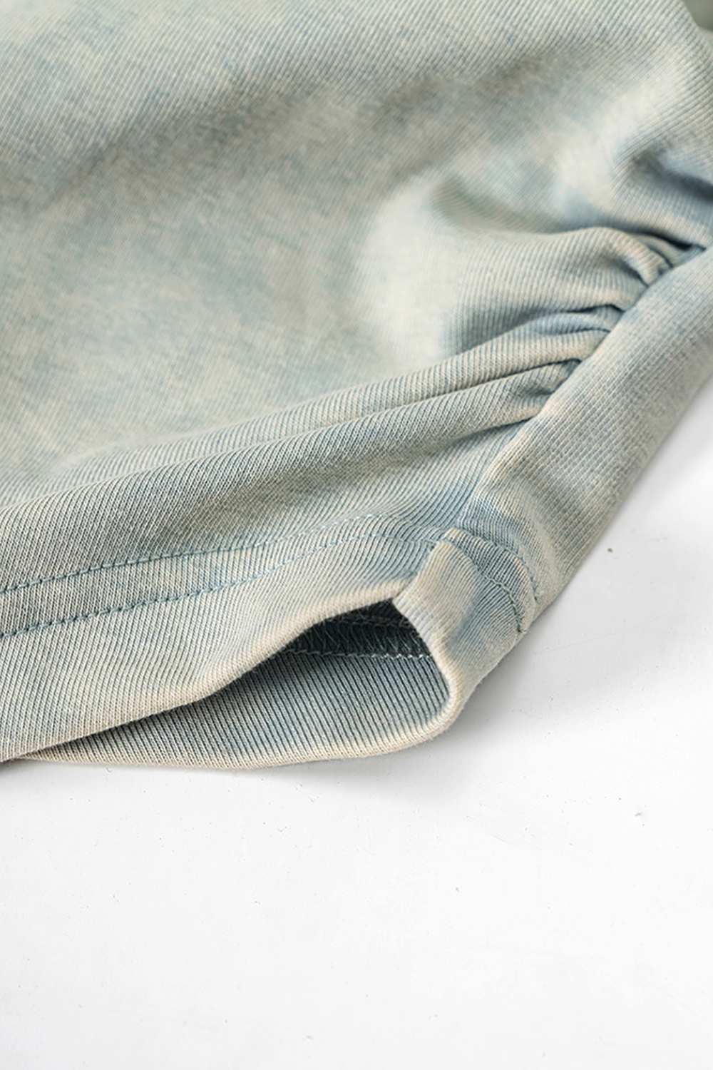 Cotton-Stretch Ruched High-Neck Cropped Tank in Haze Blue - front modeled view