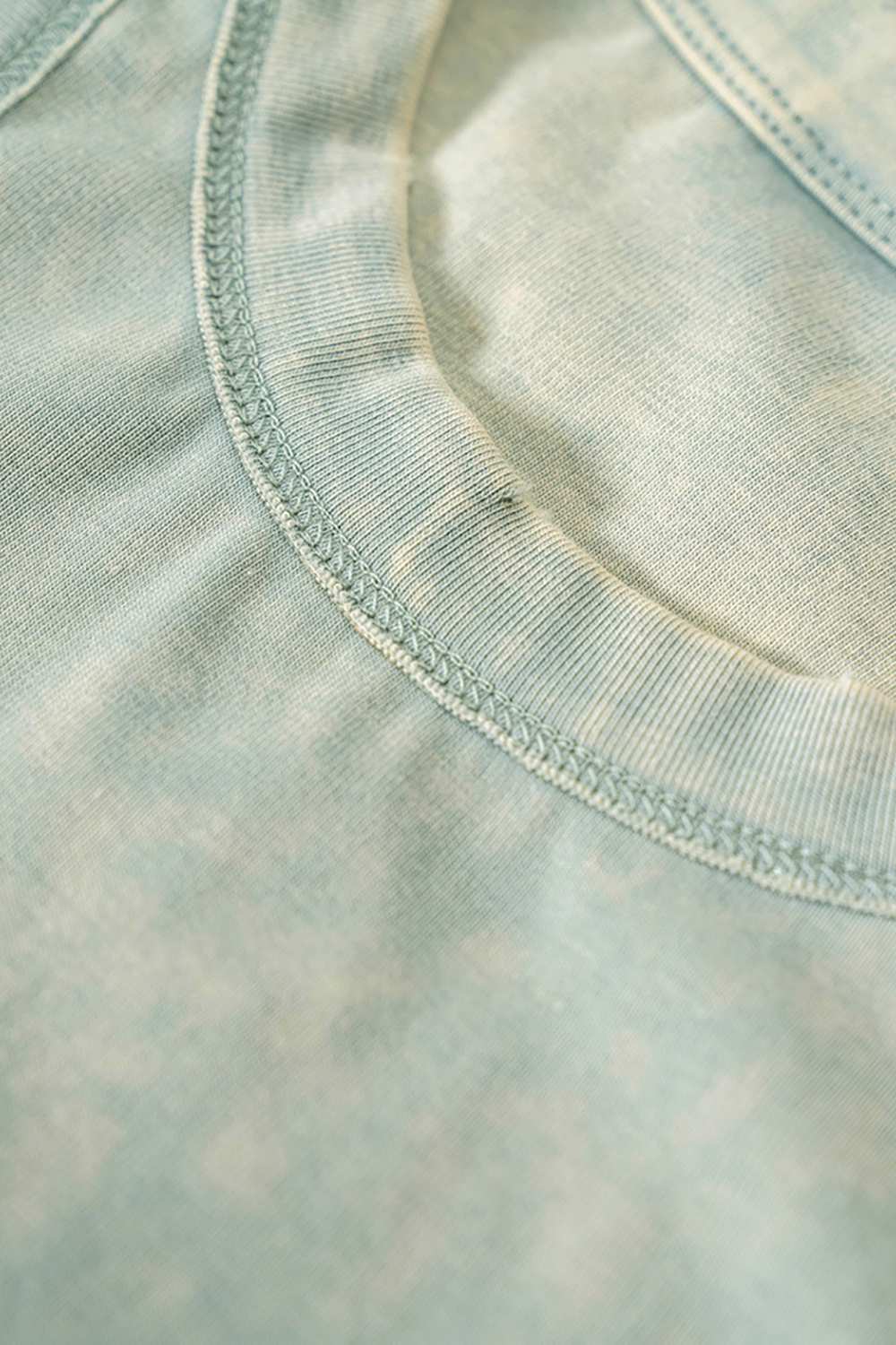 Cotton-Stretch Ruched High-Neck Cropped Tank in Haze Blue - front modeled view