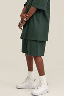 Heavyweight Cotton-Blend Relaxed Sweat Shorts in Blackish Green - product detail close-up
