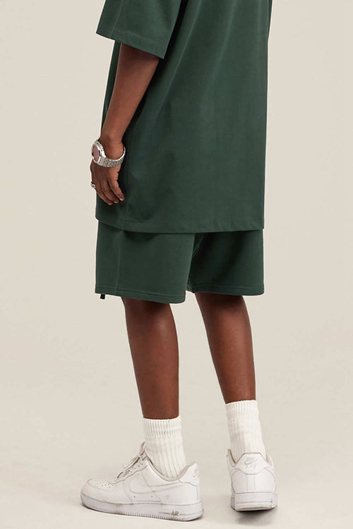 Heavyweight Cotton-Blend Relaxed Sweat Shorts in Blackish Green - product detail close-up