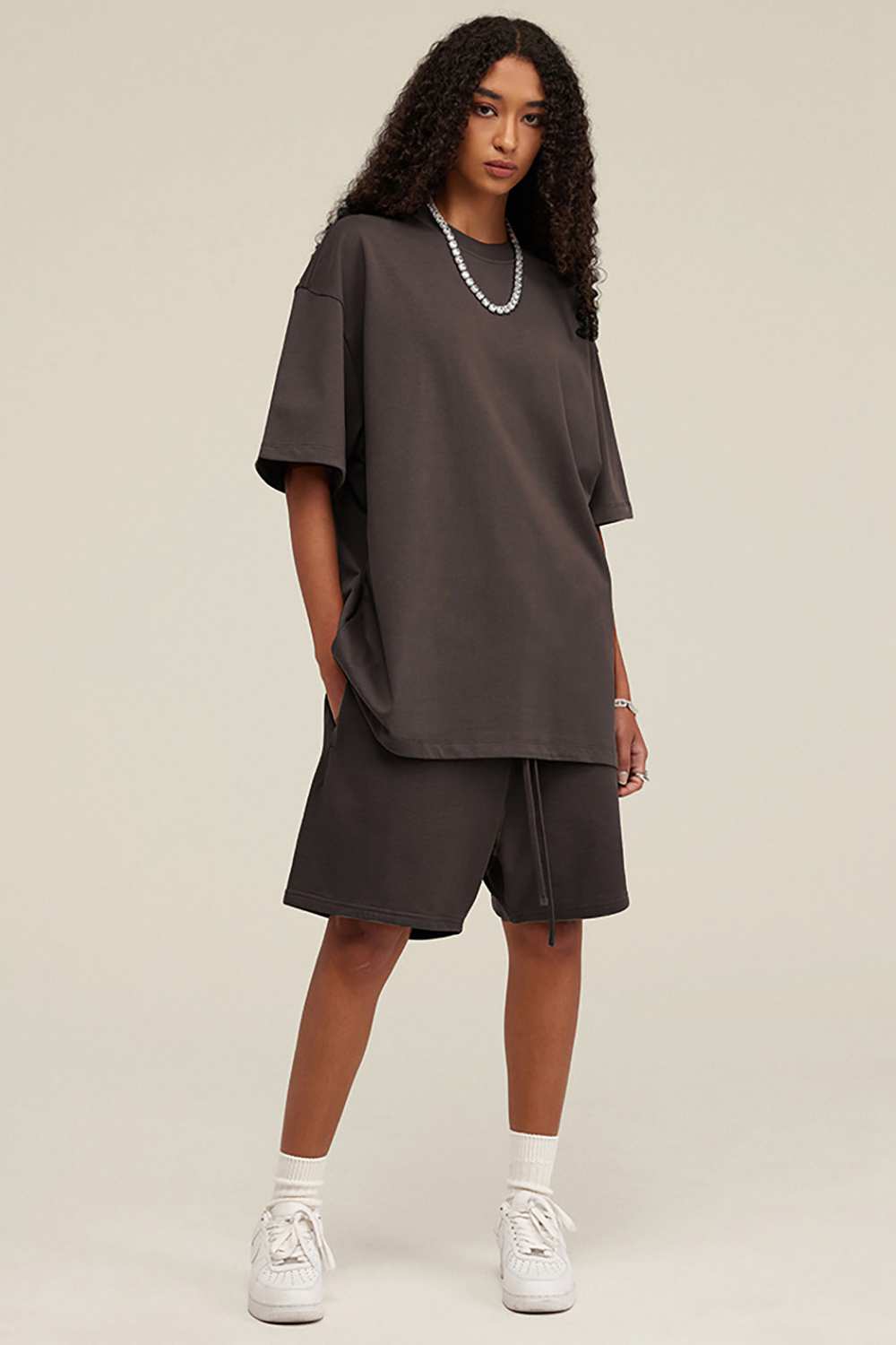 Heavyweight Cotton-Blend Relaxed Sweat Shorts in Charcoal - three-quarter front modeled view