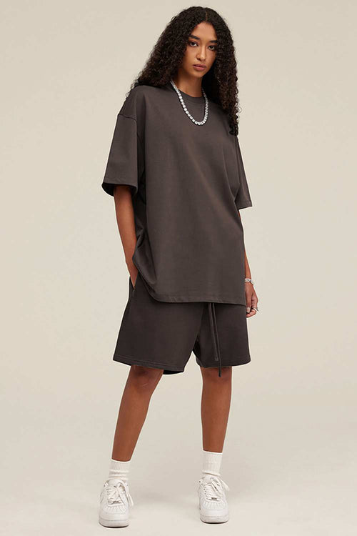 Heavyweight Cotton-Blend Relaxed Sweat Shorts in Charcoal - three-quarter front modeled view