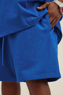 Heavyweight Cotton-Blend Relaxed Sweat Shorts in Colorful Blue - pocket detail