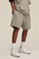 Heavyweight Cotton-Blend Relaxed Sweat Shorts in Gray Apricot - product detail close-up
