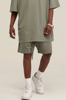 Heavyweight Cotton-Blend Relaxed Sweat Shorts in Grayish Green - product detail close-up