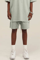 Heavyweight Cotton-Blend Relaxed Sweat Shorts in Halo Green - product detail close-up