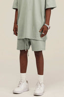 Heavyweight Cotton-Blend Relaxed Sweat Shorts in Halo Green - product detail close-up