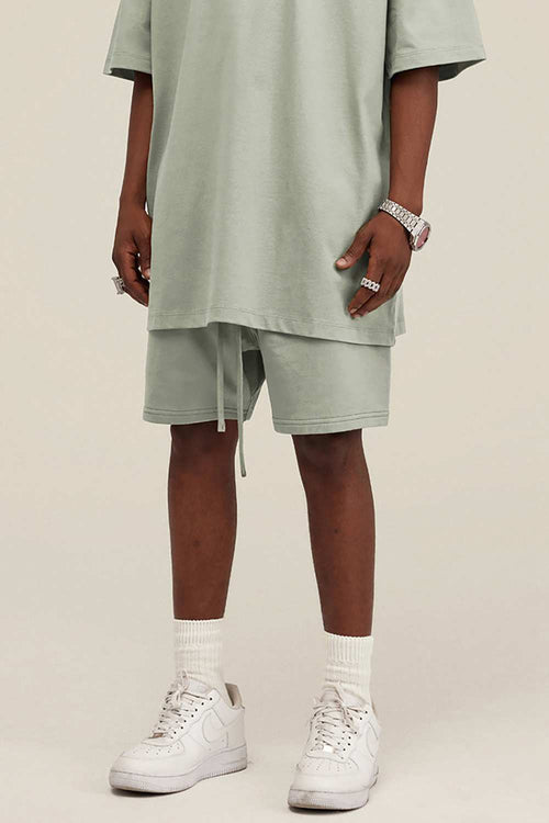 Heavyweight Cotton-Blend Relaxed Sweat Shorts in Halo Green - product detail close-up