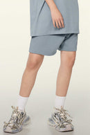 Heavyweight Cotton-Blend Relaxed Sweat Shorts in Haze Blue - product detail close-up