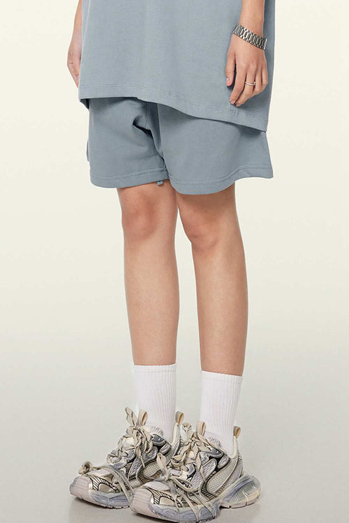 Heavyweight Cotton-Blend Relaxed Sweat Shorts in Haze Blue - product detail close-up