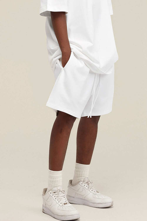 Heavyweight Cotton-Blend Relaxed Sweat Shorts in White - product detail close-up