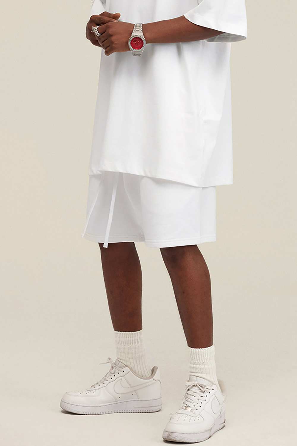 Heavyweight Cotton-Blend Relaxed Sweat Shorts in White - product detail close-up