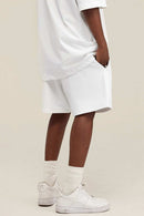 Heavyweight Cotton-Blend Relaxed Sweat Shorts in White - product detail close-up