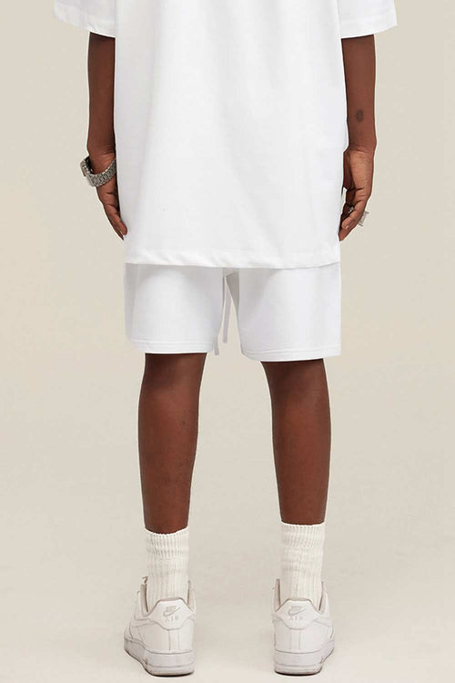 Heavyweight Cotton-Blend Relaxed Sweat Shorts in White - product detail close-up