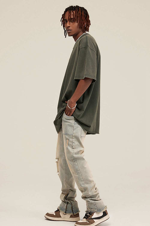 Washed Distressed-Fade Relaxed Cotton T-Shirt in Grayish Green - full-length side modeled view