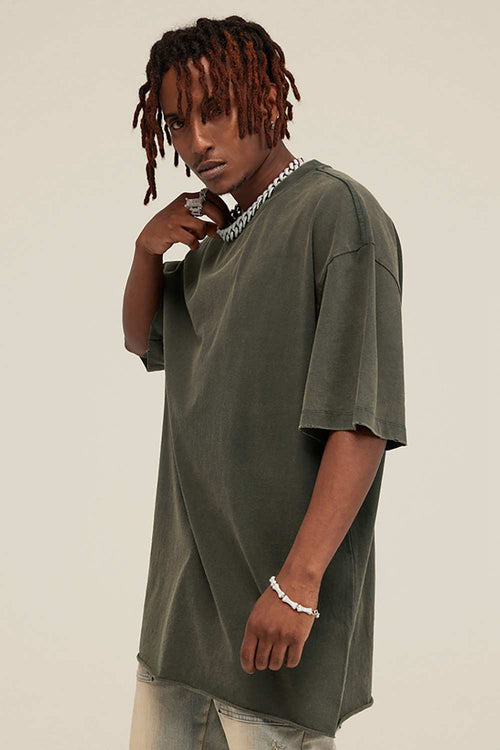 Washed Distressed-Fade Relaxed Cotton T-Shirt in Grayish Green - three-quarter front modeled view