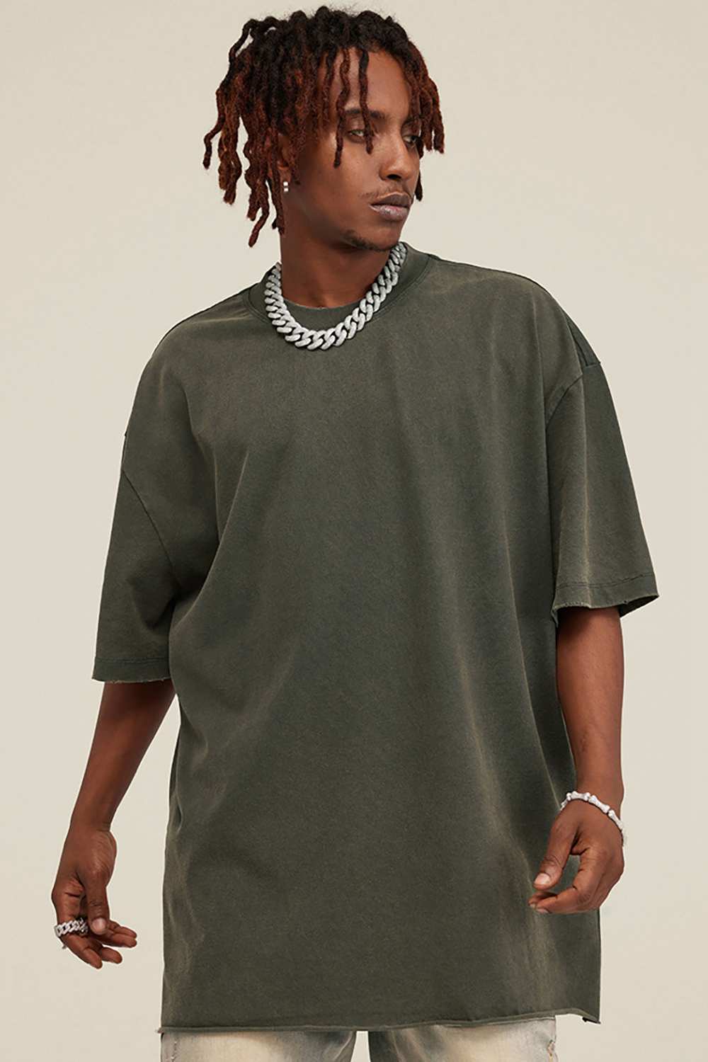 Washed Distressed-Fade Relaxed Cotton T-Shirt in Grayish Green - front modeled close-up