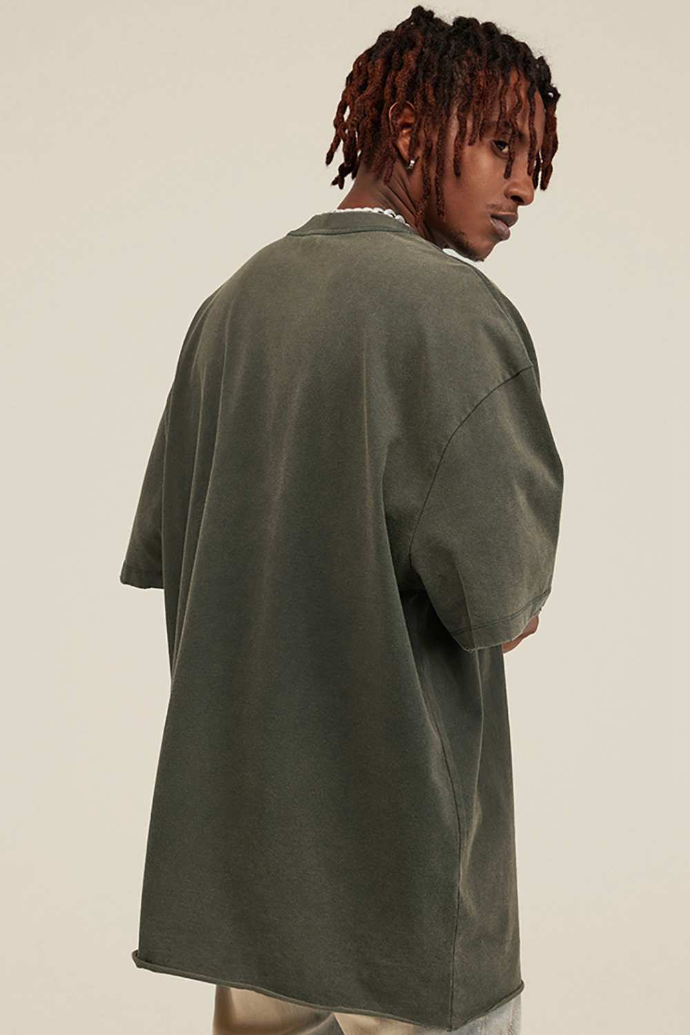 Washed Distressed-Fade Relaxed Cotton T-Shirt in Grayish Green - product detail close-up