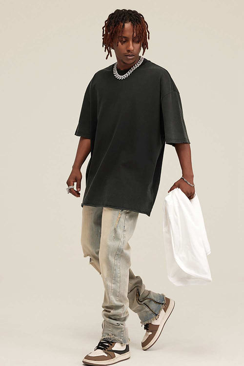 Washed Distressed-Fade Relaxed Cotton T-Shirt in Rust Black - full-length front modeled view