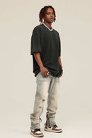 Washed Distressed-Fade Relaxed Cotton T-Shirt in Rust Black - three-quarter front modeled view