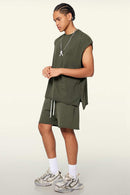 Washed Cotton Split-Hem Longline Tank Top in Military Green - three-quarter front modeled view