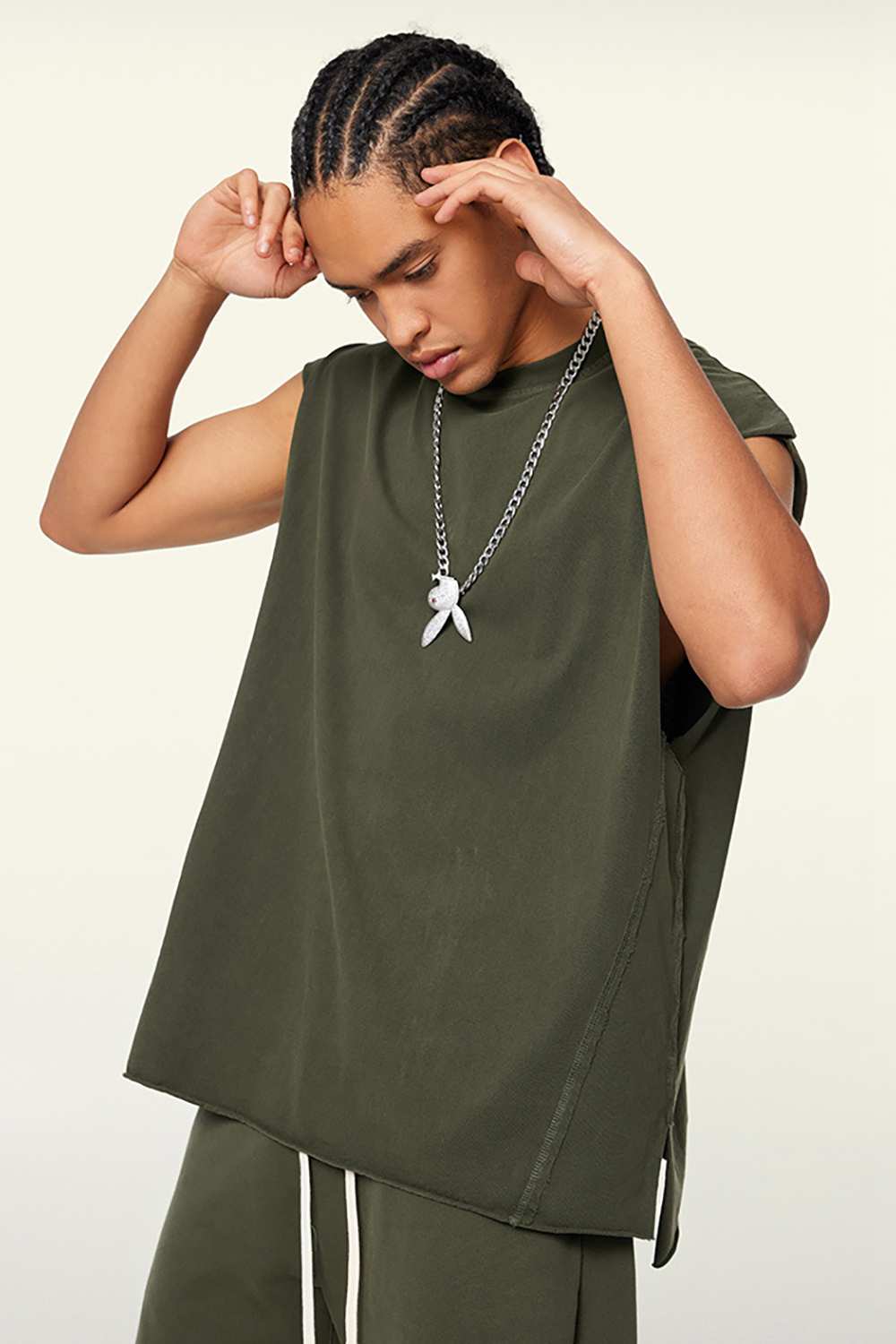 Washed Cotton Split-Hem Longline Tank Top in Military Green - three-quarter front modeled view