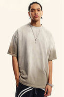 Breathable Gradient-Washed Relaxed Cotton T-Shirt in Sand - front modeled close-up