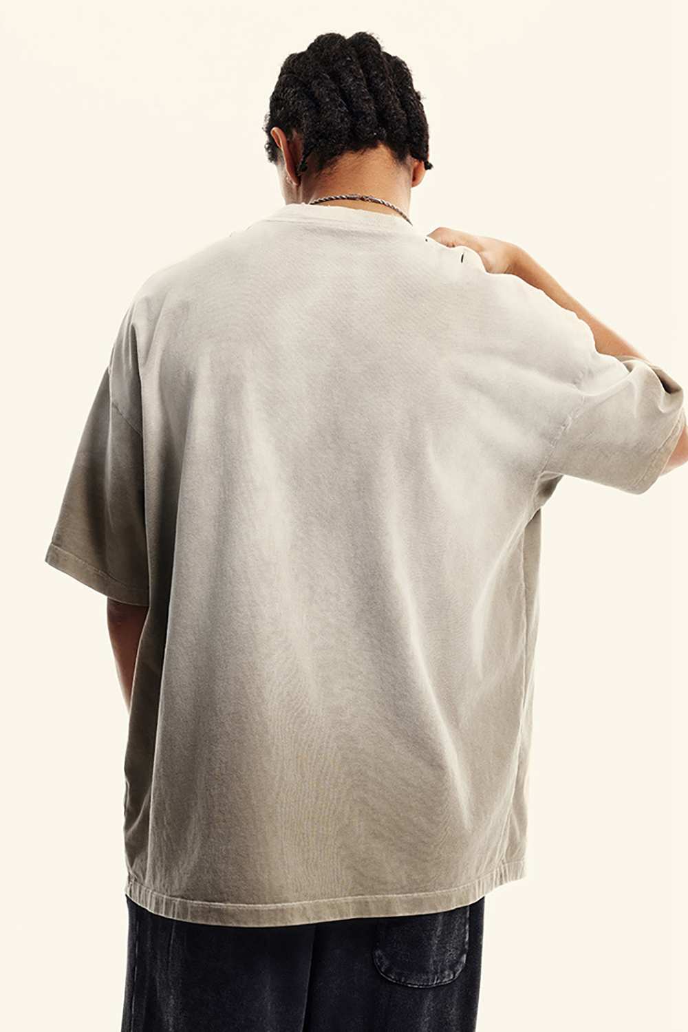 Breathable Gradient-Washed Relaxed Cotton T-Shirt in Sand - back modeled view