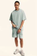 Heavyweight Washed Raw-Edge Cotton T-Shirt in Light Gray - full-length front modeled view