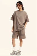 Heavyweight Washed Raw-Edge Cotton T-Shirt in Mud - full-length front modeled view