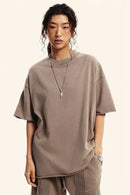 Heavyweight Washed Raw-Edge Cotton T-Shirt in Mud - front modeled view