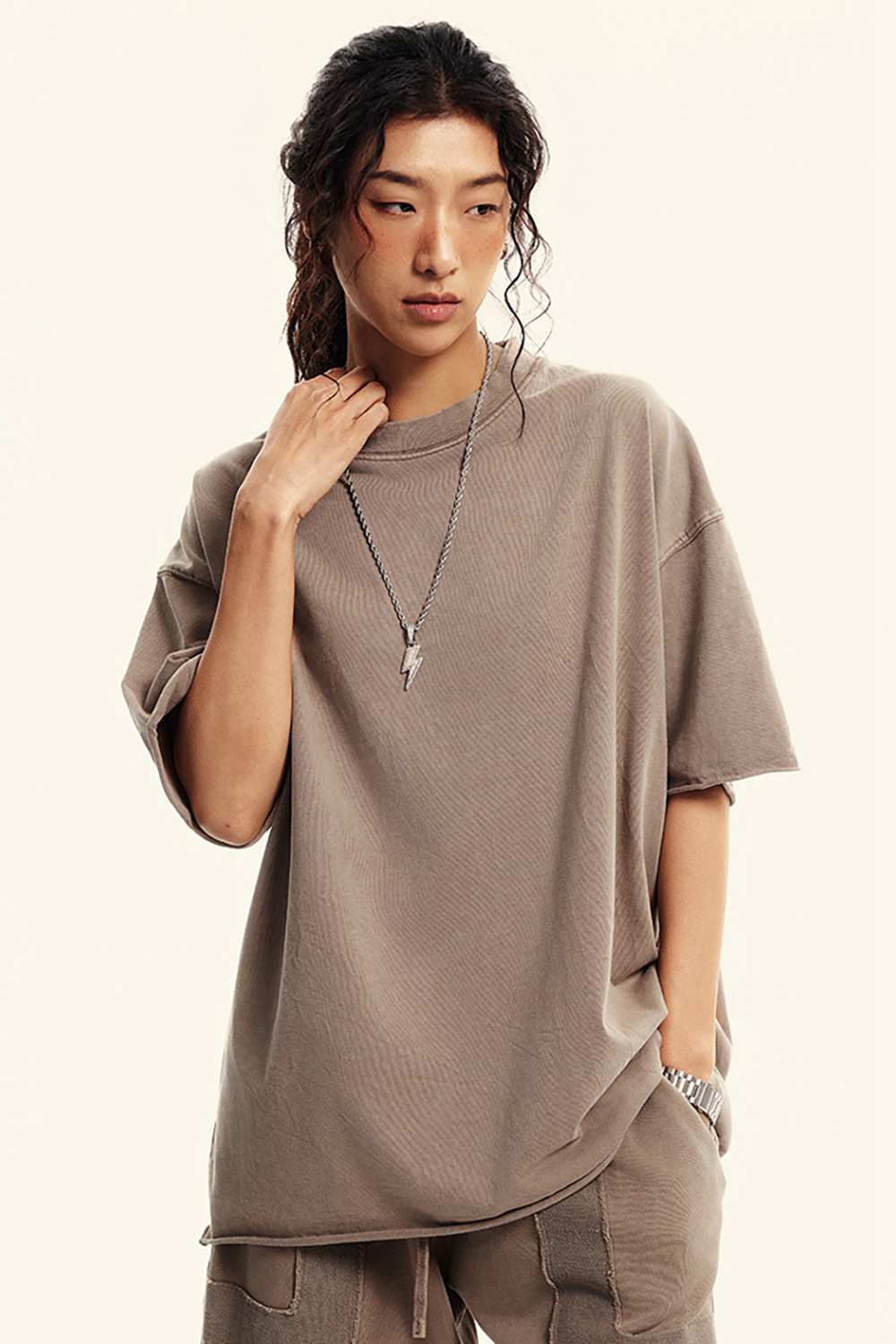 Heavyweight Washed Raw-Edge Cotton T-Shirt in Mud - front modeled view