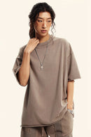 Heavyweight Washed Raw-Edge Cotton T-Shirt in Mud - front modeled view