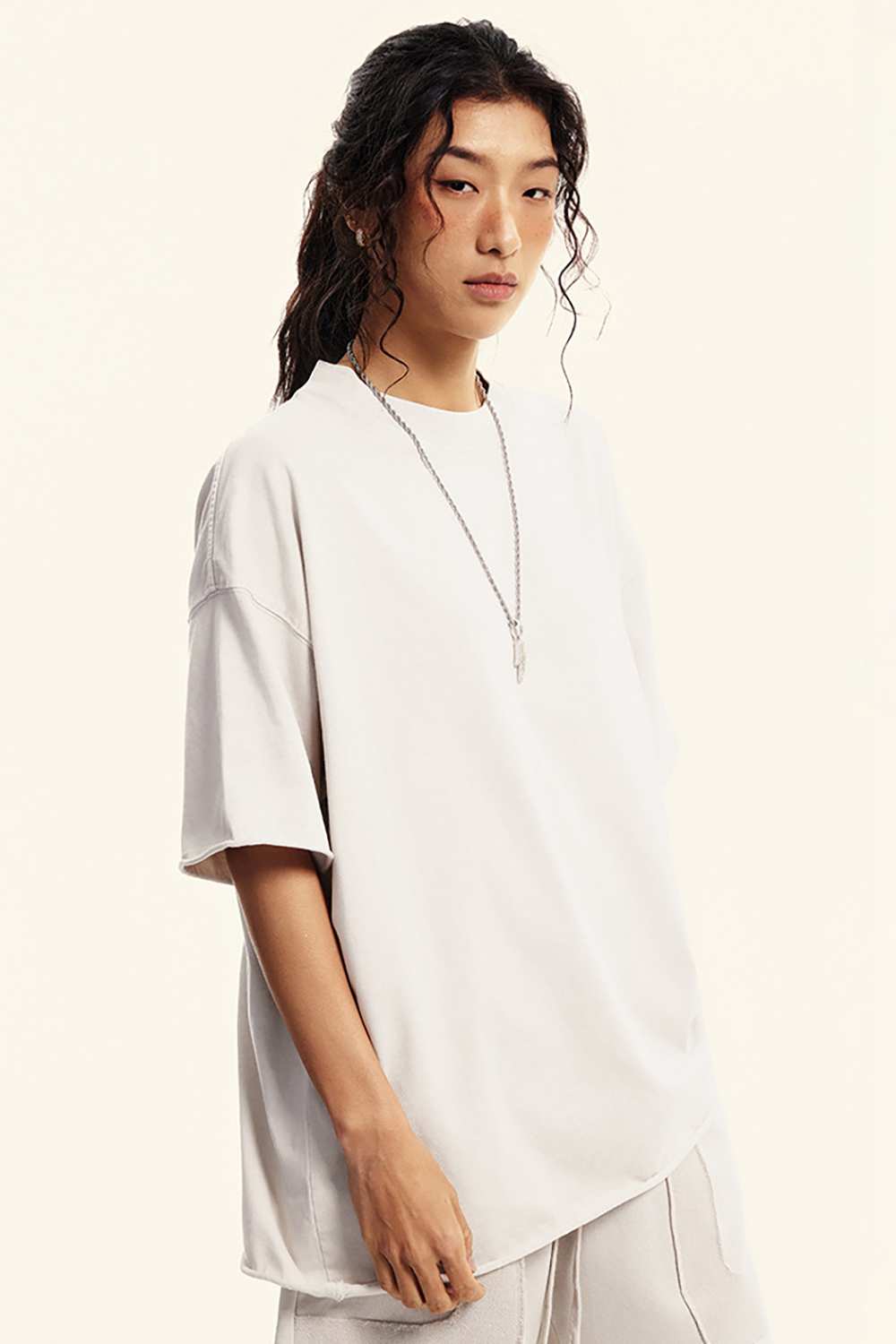 Heavyweight Washed Raw-Edge Cotton T-Shirt in Slate Rice - front modeled view