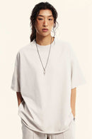 Heavyweight Washed Raw-Edge Cotton T-Shirt in Slate Rice - front modeled view