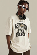 Washed Layered-Letter Graphic Relaxed Cotton T-Shirt in Gray Apricot - three-quarter front modeled view