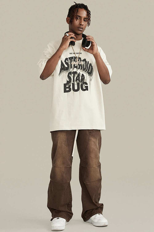 Washed Layered-Letter Graphic Relaxed Cotton T-Shirt in Gray Apricot - full-length front modeled view