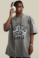 Washed Layered-Letter Graphic Relaxed Cotton T-Shirt in Medium Gray - front modeled close-up