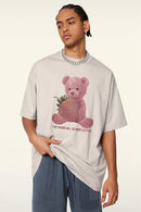 Cool-Touch Quick-Drying Bear Graphic Oversized T-Shirt in Sandy Apricot - front modeled view