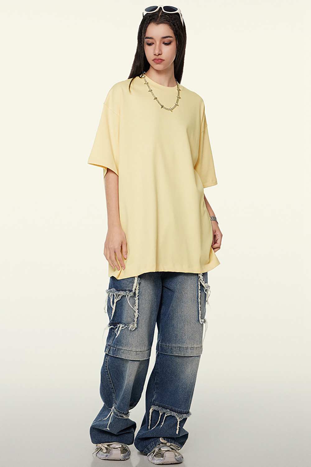Heavyweight Cotton Relaxed Drop-Shoulder T-Shirt in Cream Apricot - full-length front modeled view